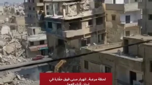 حادث مفزع.. انهيار مبنى فوق حفارة ونجاة السائق بأعجوبة